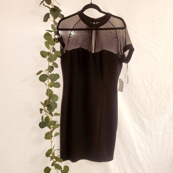 bebe Dresses & Skirts - BEBE Black dress w/ short sleeve mesh and sweetheart neckline built in SZ 12